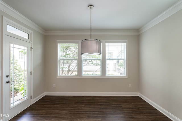 5638 Wade Park Blvd, Raleigh, NC 27607 - unfurnished dining area featuring plenty of natural light, dark wood-type flooring, ornamental molding, and baseboards