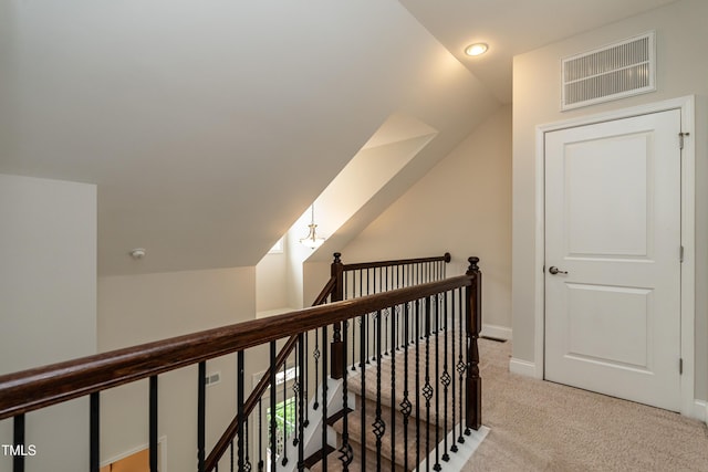5638 Wade Park Blvd, Raleigh, NC 27607 - hall with an upstairs landing, light colored carpet, lofted ceiling, recessed lighting, and baseboards