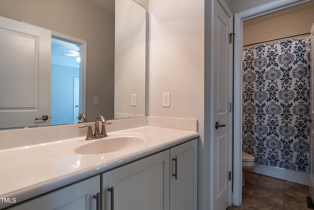5638 Wade Park Blvd, Raleigh, NC 27607 - full bathroom with vanity, toilet, a shower with shower curtain, and tile patterned floors