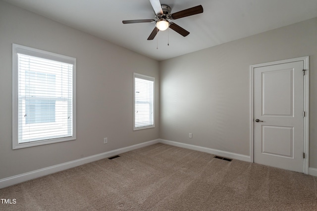 5638 Wade Park Blvd, Raleigh, NC 27607 - carpeted empty room with baseboards and a ceiling fan