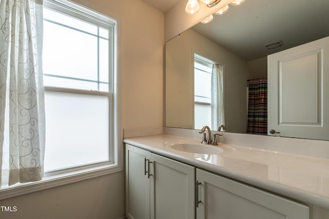 5638 Wade Park Blvd, Raleigh, NC 27607 - bathroom featuring vanity and healthy amount of natural light