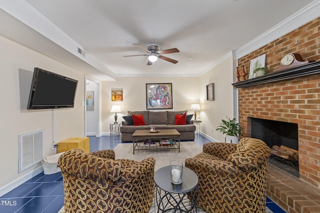 2901 Ceremonial Ct, Raleigh, NC 27615 - living area with baseboards, a ceiling fan, a brick fireplace, ornamental molding, and tile patterned flooring