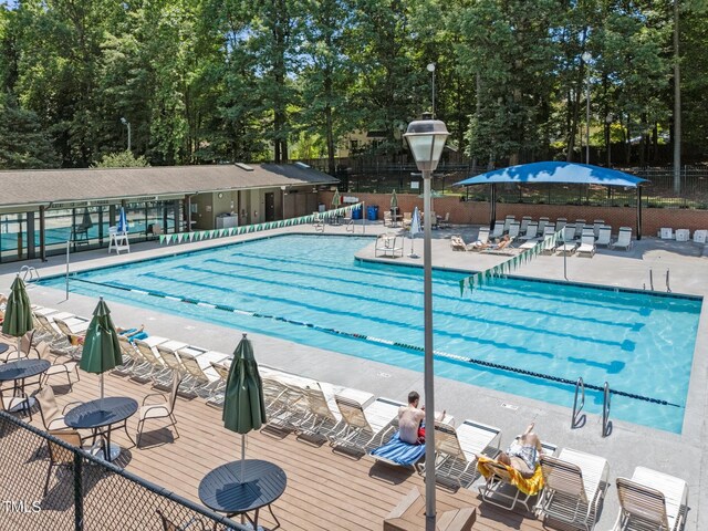2901 Ceremonial Ct, Raleigh, NC 27615 - community pool with view of wooded area