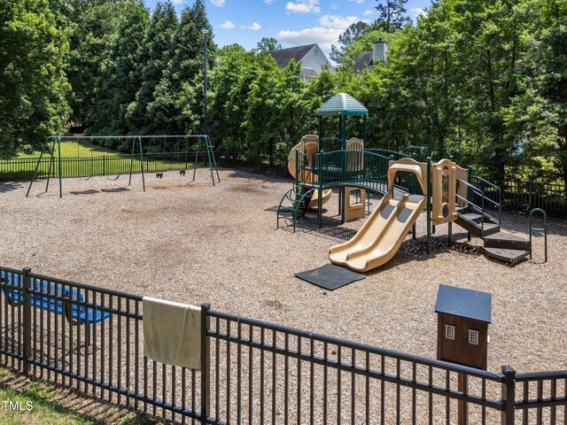 2901 Ceremonial Ct, Raleigh, NC 27615 - community play area featuring view of wooded area