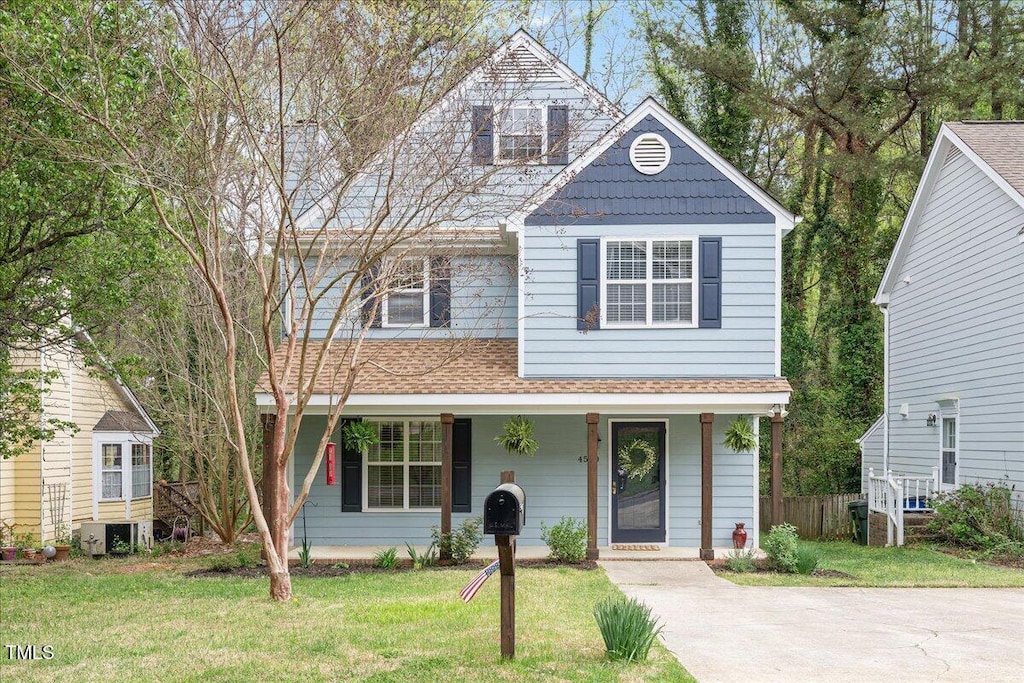 4520 Timberhurst Dr, Raleigh, NC 27612 - view of front of property with a porch and a shingled roof
