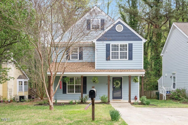 4520 Timberhurst Dr, Raleigh, NC 27612 - view of front of property with a porch and a shingled roof