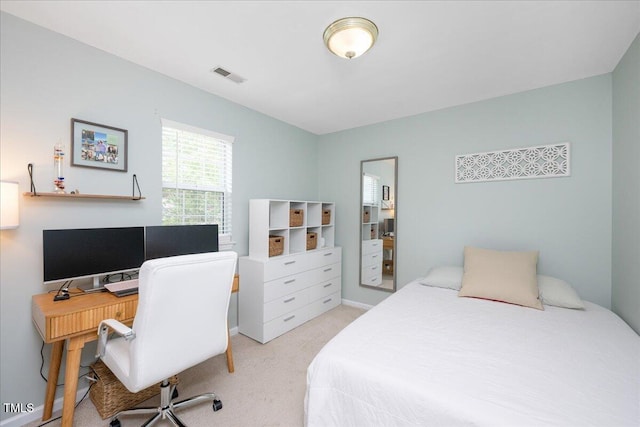 4520 Timberhurst Dr, Raleigh, NC 27612 - bedroom with light colored carpet and an office area