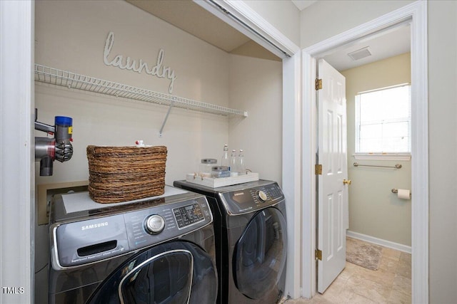 4520 Timberhurst Dr, Raleigh, NC 27612 - washroom featuring separate washer and dryer and baseboards