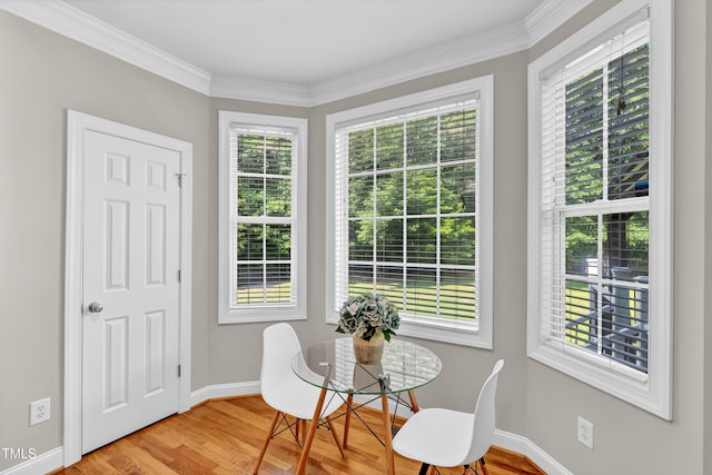 8140 Consella Way, Willow Springs, NC 27592 - dining space featuring baseboards, light wood-style flooring, and ornamental molding