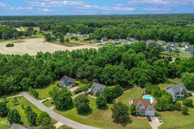 8140 Consella Way, Willow Springs, NC 27592 - aerial perspective of suburban area with a forest