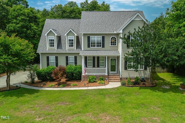 8140 Consella Way, Willow Springs, NC 27592 - view of front of home with covered porch and roof with shingles
