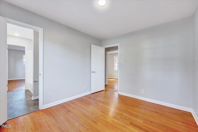 8004 Summit Dr, Goldsboro, NC 27530 - spare room with light wood-type flooring, baseboards, and healthy amount of natural light