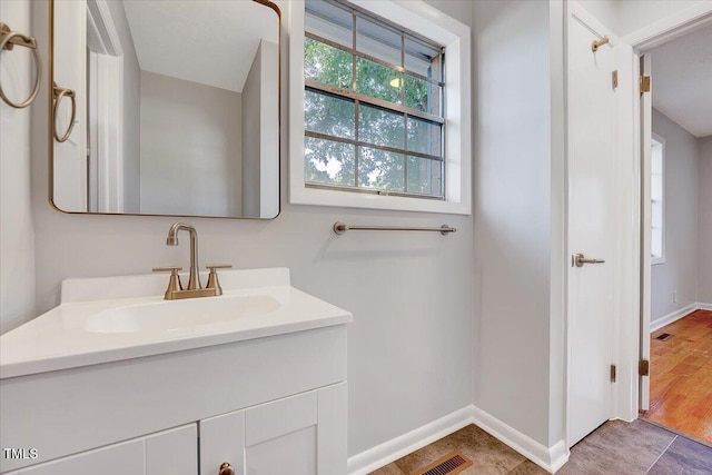 8004 Summit Dr, Goldsboro, NC 27530 - bathroom featuring vanity and baseboards