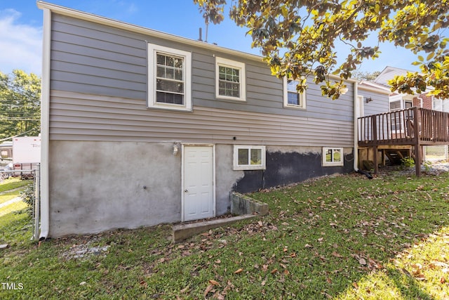 1818 Cecil St, Durham, NC 27707 - back of house with a wooden deck, a yard, and stucco siding