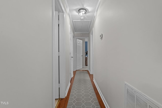 815 Walter Bright Rd, Sanford, NC 27330 - hallway with attic access, ornamental molding, and baseboards