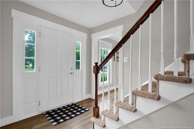 4101 Vann Dr, Lumberton, NC 28358 - entrance foyer with stairs, wood finished floors, and plenty of natural light
