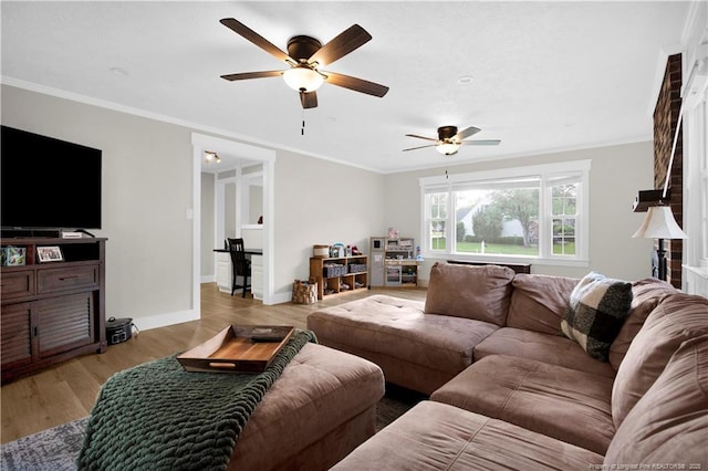 4101 Vann Dr, Lumberton, NC 28358 - living area featuring a ceiling fan, light wood-style flooring, crown molding, and baseboards
