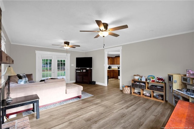 4101 Vann Dr, Lumberton, NC 28358 - bedroom with french doors, wood finished floors, crown molding, access to exterior, and baseboards