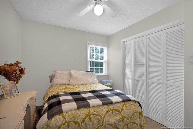 4101 Vann Dr, Lumberton, NC 28358 - carpeted bedroom with a closet, ceiling fan, and a textured ceiling
