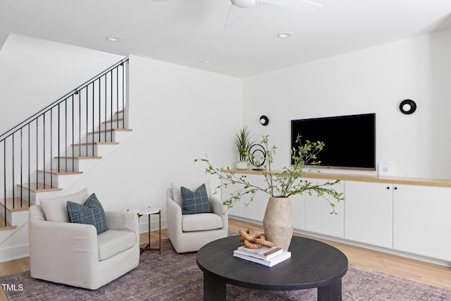 1405 Watts St, Durham, NC 27701 - living room featuring wood finished floors, stairs, ceiling fan, and recessed lighting