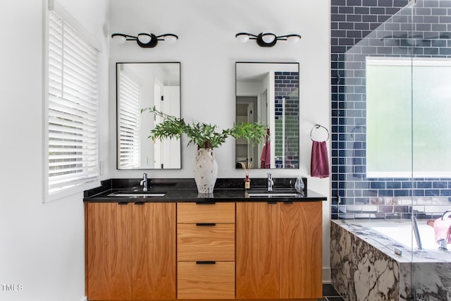 1405 Watts St, Durham, NC 27701 - bathroom featuring double vanity and a bath