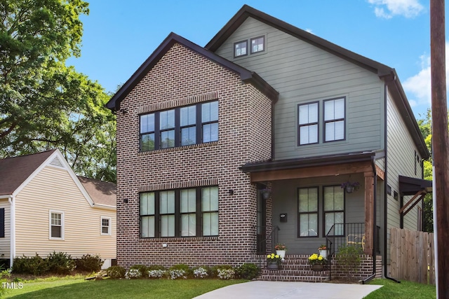1405 Watts St, Durham, NC 27701 - traditional-style house featuring brick siding and covered porch