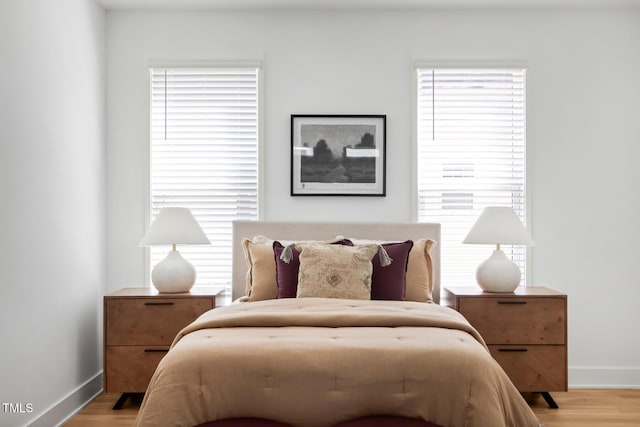 1405 Watts St, Durham, NC 27701 - bedroom with light wood finished floors and baseboards