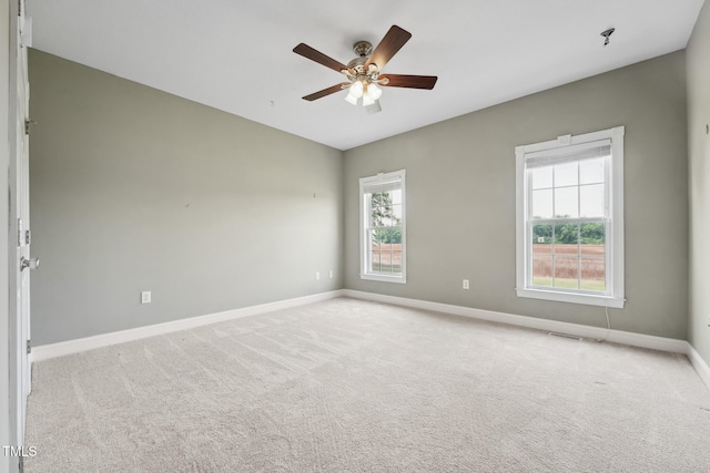 105 Bagley Ln, Dunn, NC 28334 - carpeted empty room with healthy amount of natural light, baseboards, and a ceiling fan