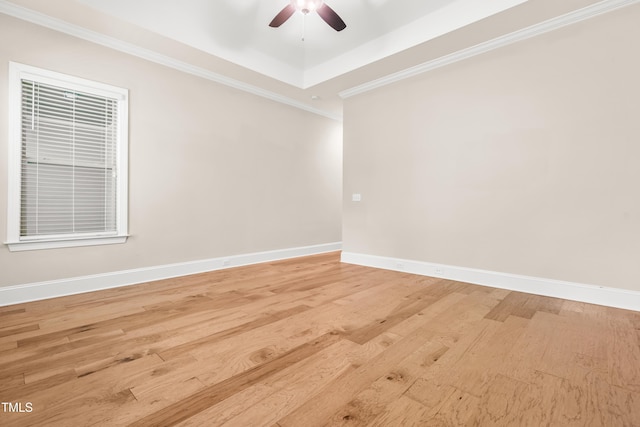 192 Glenpark Pl, Cary, NC 27511 - unfurnished room with a ceiling fan, baseboards, light wood-style flooring, and ornamental molding