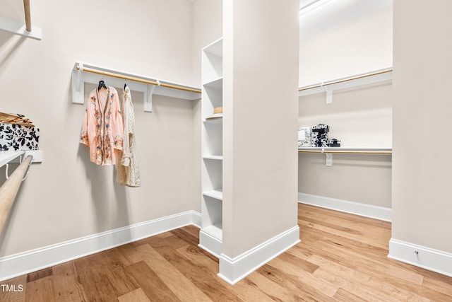 192 Glenpark Pl, Cary, NC 27511 - walk in closet featuring wood finished floors