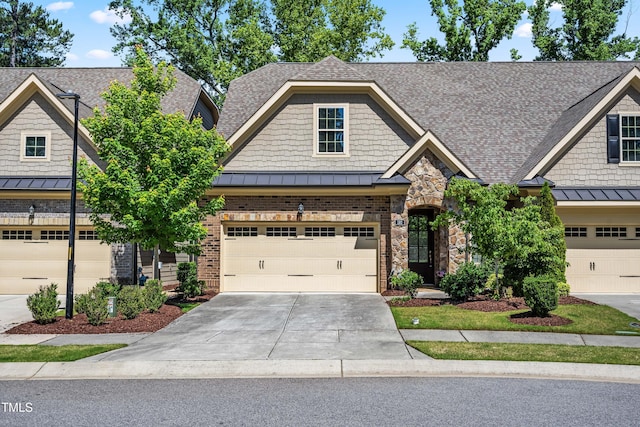 192 Glenpark Pl, Cary, NC 27511 - craftsman inspired home with a standing seam roof, concrete driveway, roof with shingles, metal roof, and a garage
