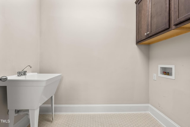192 Glenpark Pl, Cary, NC 27511 - washroom featuring hookup for a washing machine, cabinet space, and baseboards