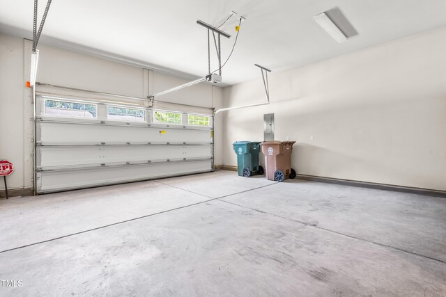 192 Glenpark Pl, Cary, NC 27511 - garage featuring a garage door opener