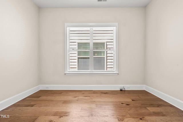 192 Glenpark Pl, Cary, NC 27511 - spare room with wood finished floors and baseboards