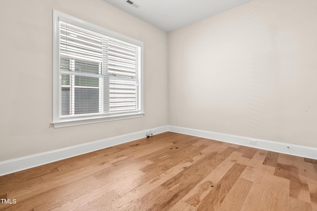 192 Glenpark Pl, Cary, NC 27511 - empty room with wood finished floors and baseboards