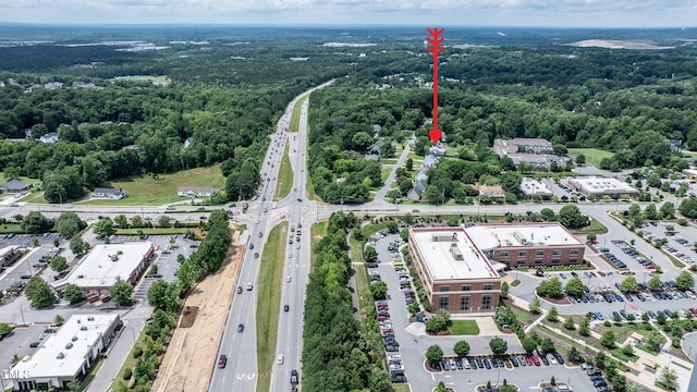 601 Country Ln, Holly Springs, NC 27540 - aerial overview of property's location with a forest and a main thoroughfare