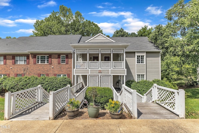 501 Gooseneck Dr Unit B2, Cary, NC 27513 - view of front of house featuring a shingled roof and a balcony