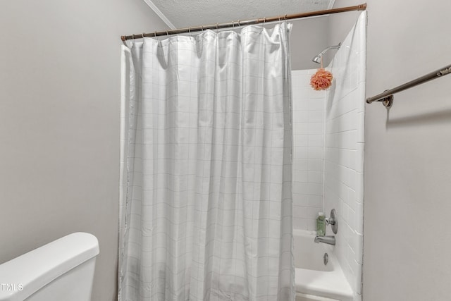 501 Gooseneck Dr Unit B2, Cary, NC 27513 - bathroom with a textured ceiling, shower / bath combination with curtain, and toilet