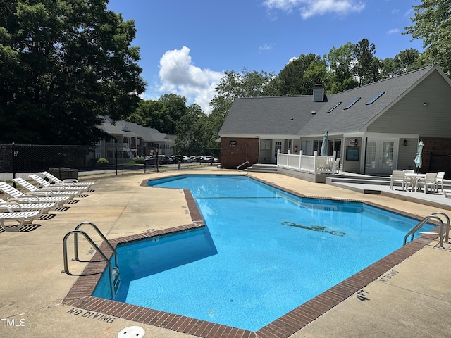 501 Gooseneck Dr Unit B2, Cary, NC 27513 - community pool featuring french doors and a patio