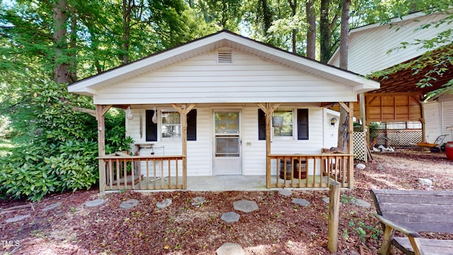 4509 Stevens Chapel Rd, Smithfield, NC 27577 - view of front facade featuring a porch