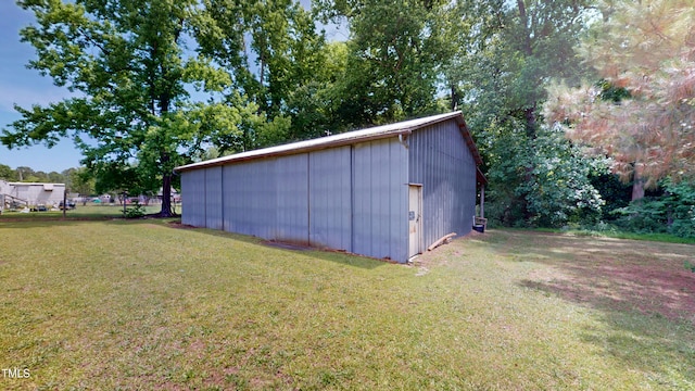 4509 Stevens Chapel Rd, Smithfield, NC 27577 - view of pole building featuring a yard