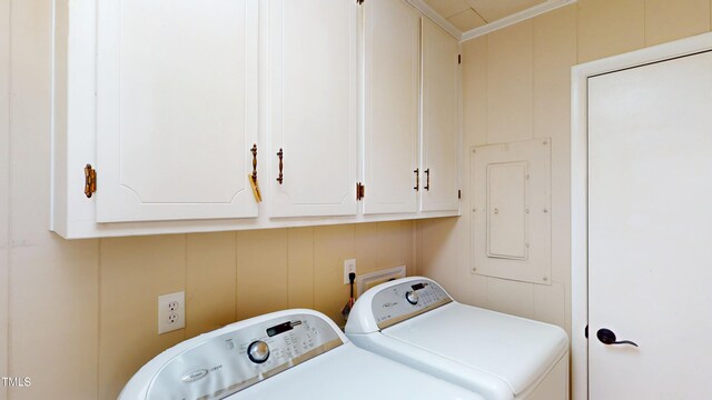 4509 Stevens Chapel Rd, Smithfield, NC 27577 - laundry room with electric panel, washing machine and clothes dryer, cabinet space, and ornamental molding