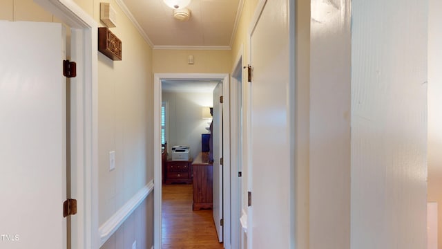 4509 Stevens Chapel Rd, Smithfield, NC 27577 - hallway with wood finished floors, crown molding, and attic access