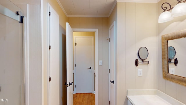 4509 Stevens Chapel Rd, Smithfield, NC 27577 - bathroom with vanity, crown molding, and wood finished floors