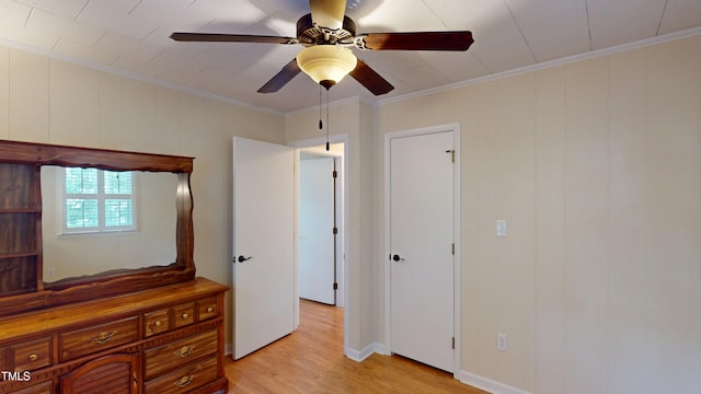 4509 Stevens Chapel Rd, Smithfield, NC 27577 - unfurnished bedroom featuring light wood-type flooring, crown molding, and a ceiling fan