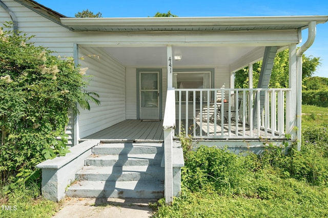 441 Cedar St, Henderson, NC 27536 - view of exterior entry featuring covered porch