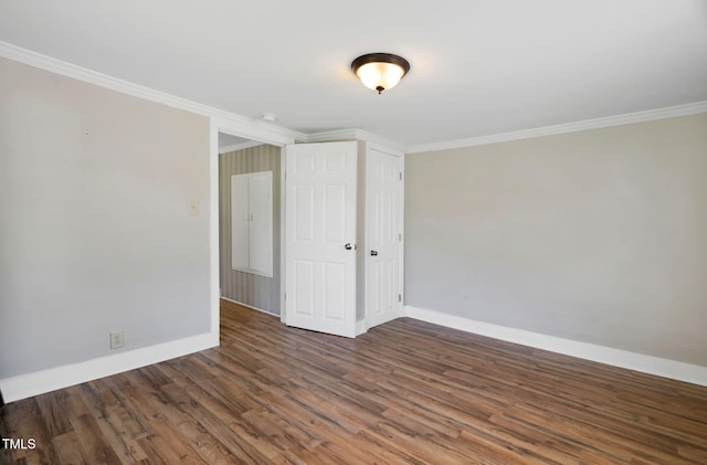 441 Cedar St, Henderson, NC 27536 - empty room with ornamental molding, wood finished floors, and baseboards