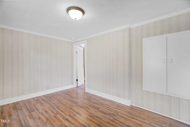 441 Cedar St, Henderson, NC 27536 - empty room with wood finished floors, crown molding, and baseboards