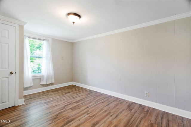 441 Cedar St, Henderson, NC 27536 - unfurnished room with wood finished floors, baseboards, and ornamental molding