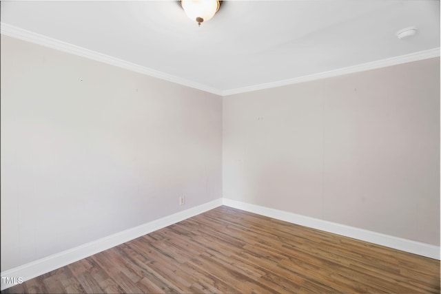 441 Cedar St, Henderson, NC 27536 - spare room featuring ornamental molding, wood finished floors, baseboards, and a smoke detector